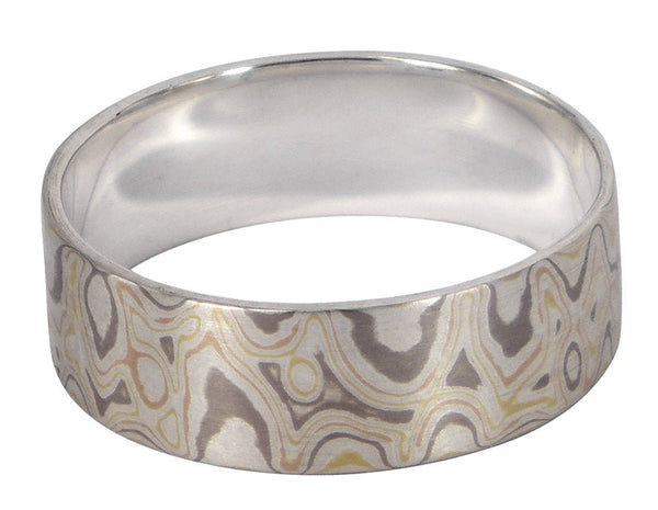 Mokume Gane men's wedding ring in 18ct white, yellow, and rose gold, designed by Melissa Baldock. A Melbourne-made piece with exquisite detail.
