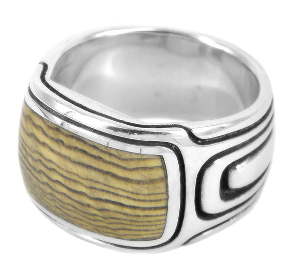 Swell (petrified wood) by Sebastian Cilento. A beautifully crafted ring blending timeless design with Australian artistry.
