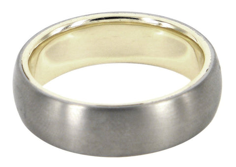 Heart of Gold men's wedding ring with a titanium exterior and 9ct yellow gold interior, crafted by David Parker. A Melbourne-made piece with a unique contrast.