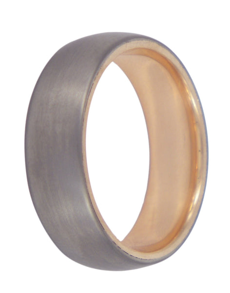 Heart of Gold men's wedding ring with a titanium exterior and 9ct rose gold interior, crafted by David Parker. A Melbourne-made piece with a unique contrast.