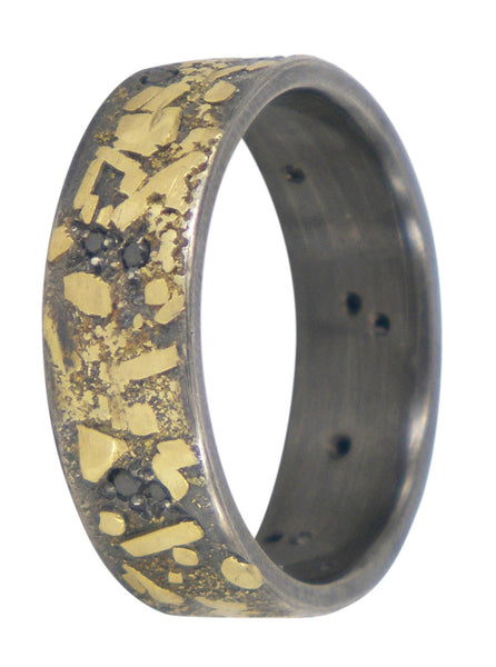 Boulder men's wedding ring with 14 black diamonds, crafted in oxidised sterling silver and 18ct yellow gold by Jeanette Dyke. A Melbourne-made standout piece.
