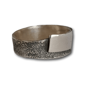 In the Fold (oxidised) by Gavin Macsporran. A beautifully crafted mens ring blending timeless design with Australian artistry.
