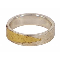 Rough & Raw men's wedding ring in 9ct white gold with 9ct yellow gold detailing, crafted by Gavin Macsporran. A Melbourne-made design with a rugged touch.
